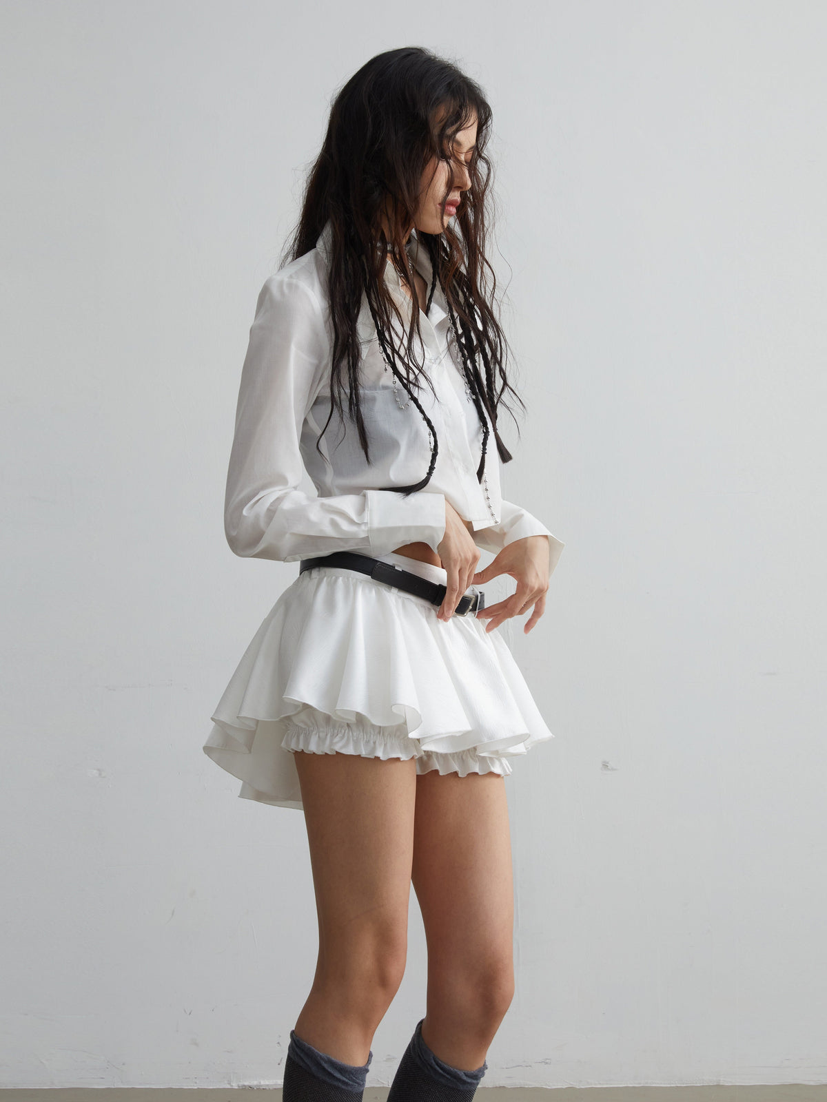 JNYLON STUDIOS White Ruffled Mini Skirt with Belt Detail