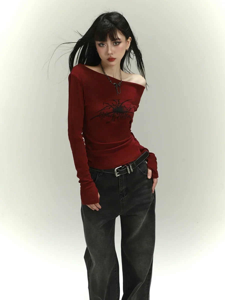 Dark Allure Off-Shoulder Graphic Top